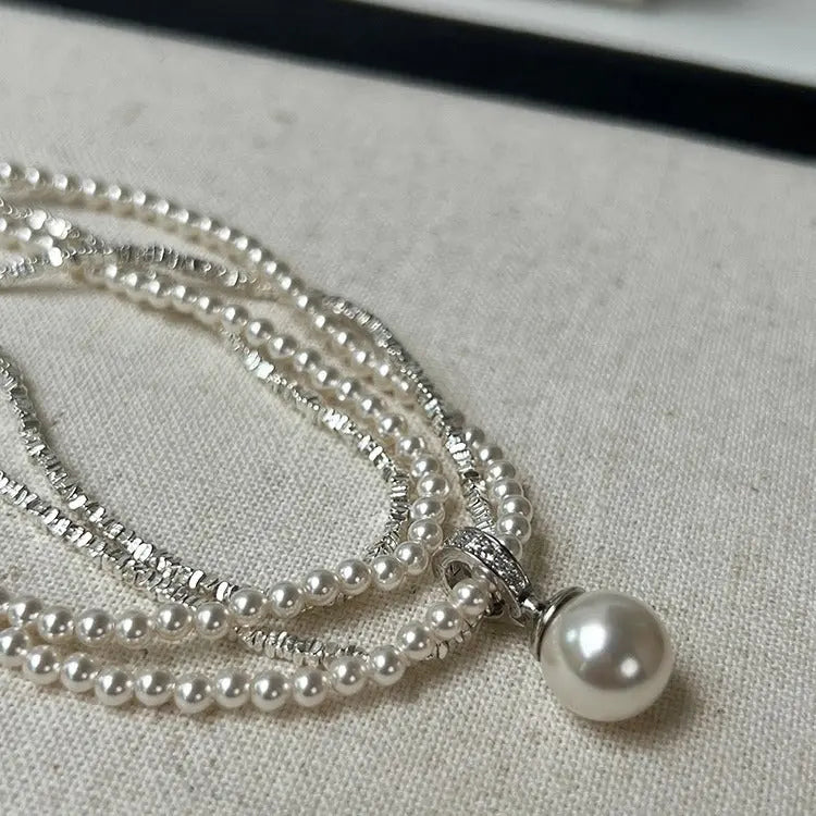 LAYERED PEARL SILVER NECKLACE Mira Gemini
